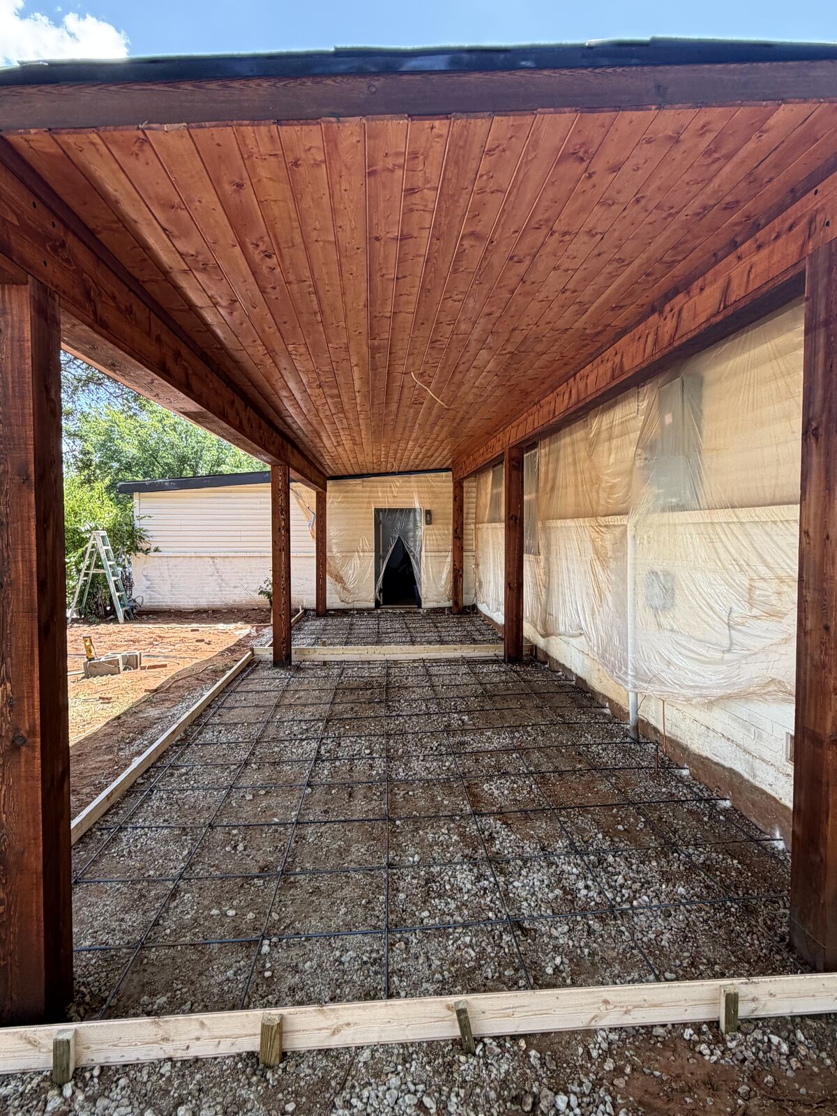 Cedar covered patio framed over a rebar tied slab ready for concrete
